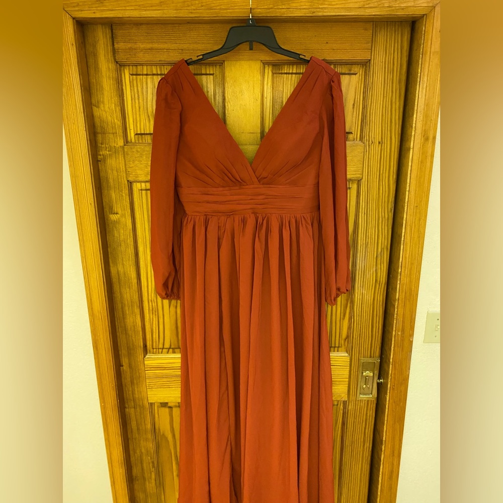 Formal dress, deep V neckline in front and back. Chiffon sleeves